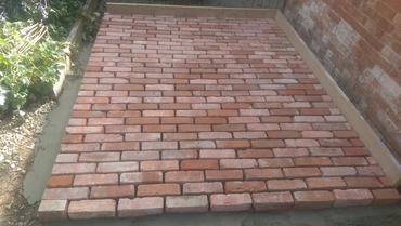 Greenhouse Base made from Reclaimed Bricks.