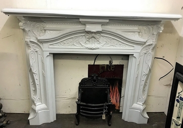 JUST IN ANTIQUE LATE VICTORIAN CAST IRON ROCOCO CHIMNEYPIECE