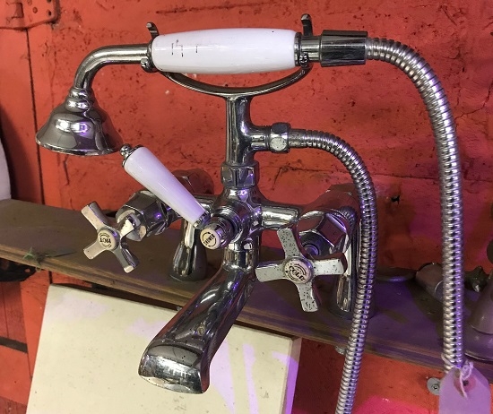 A reclaimed set of Chrome telephone taps