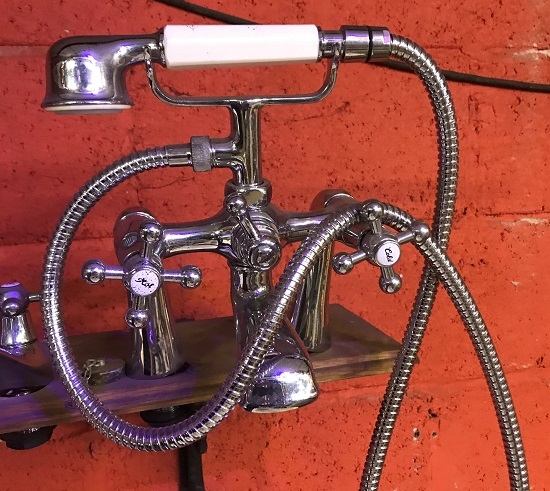 A reclaimed set of chrome telephone taps