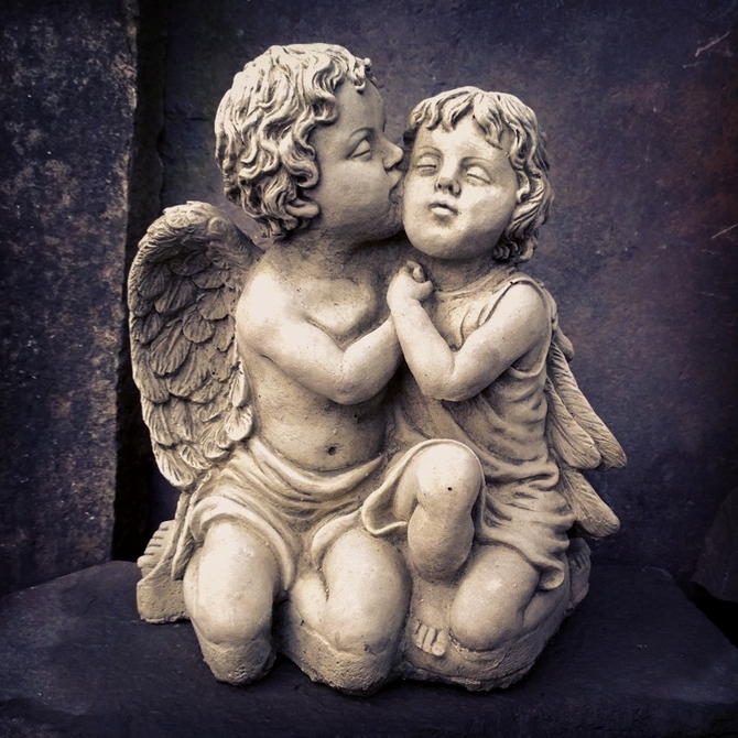 Cherubs Kissing